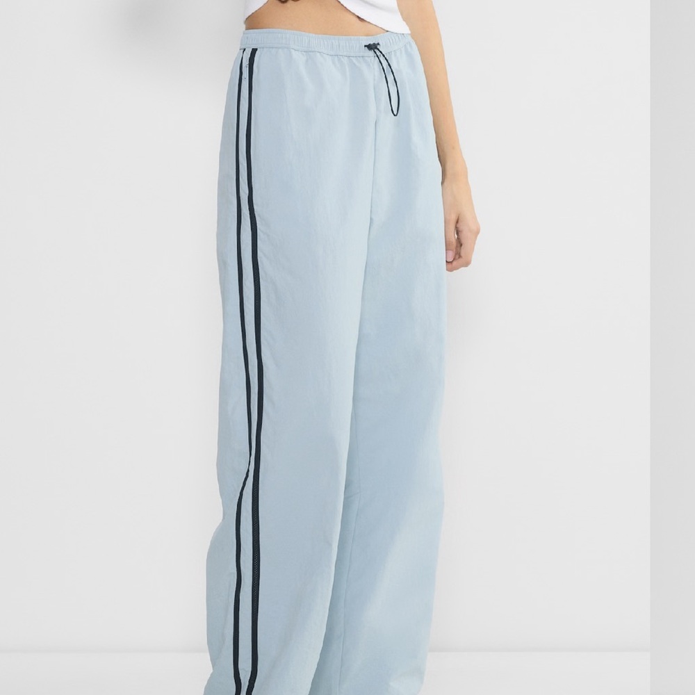 TNA water-repellant capadino Light Blue Track Pants with Black Stripes!! NWT